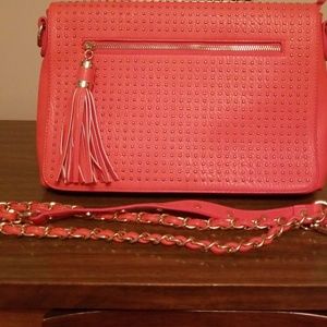 Coral clutch with gold stud detail